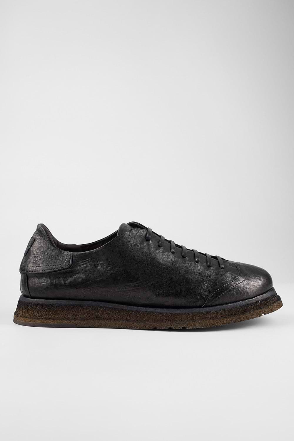 AJAX black distressed lightweight hybrid sneakers.