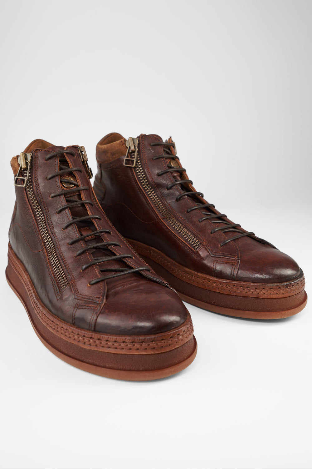 COLE cognac welted double-zip high sneakers.