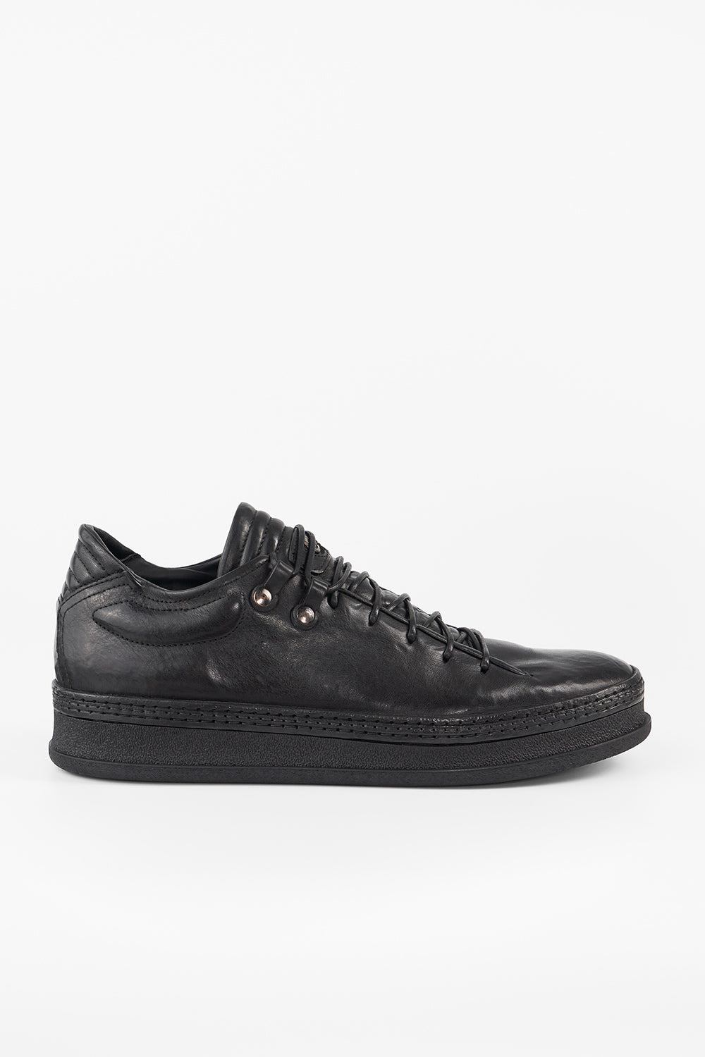 COLE rugged-black welted distressed loop sneakers.