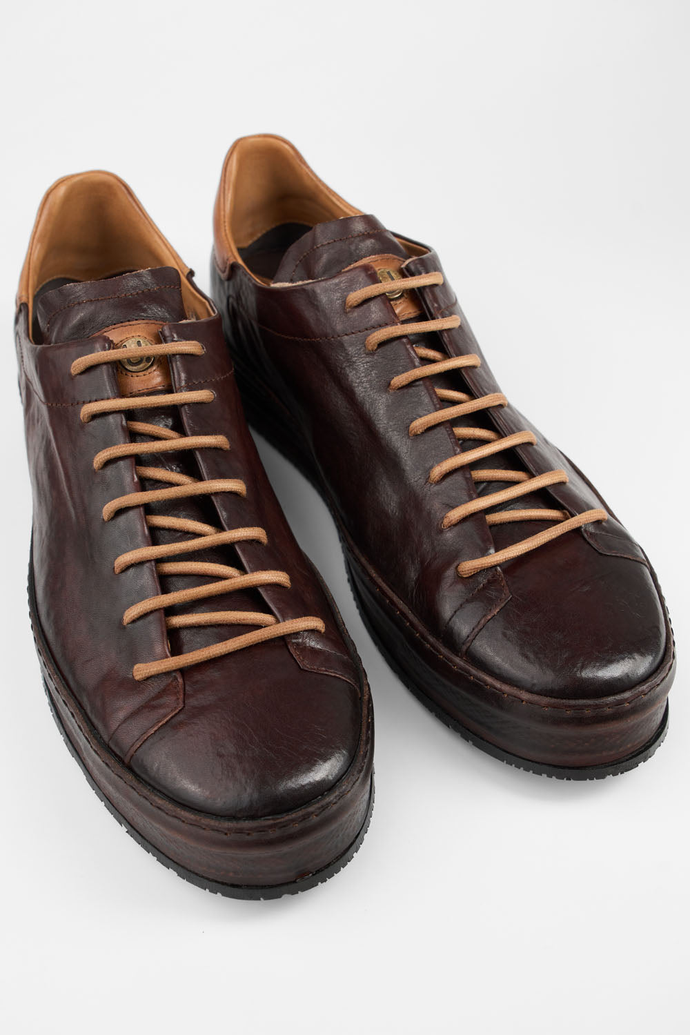 HAYES dark-cocoa distressed welted sneakers.