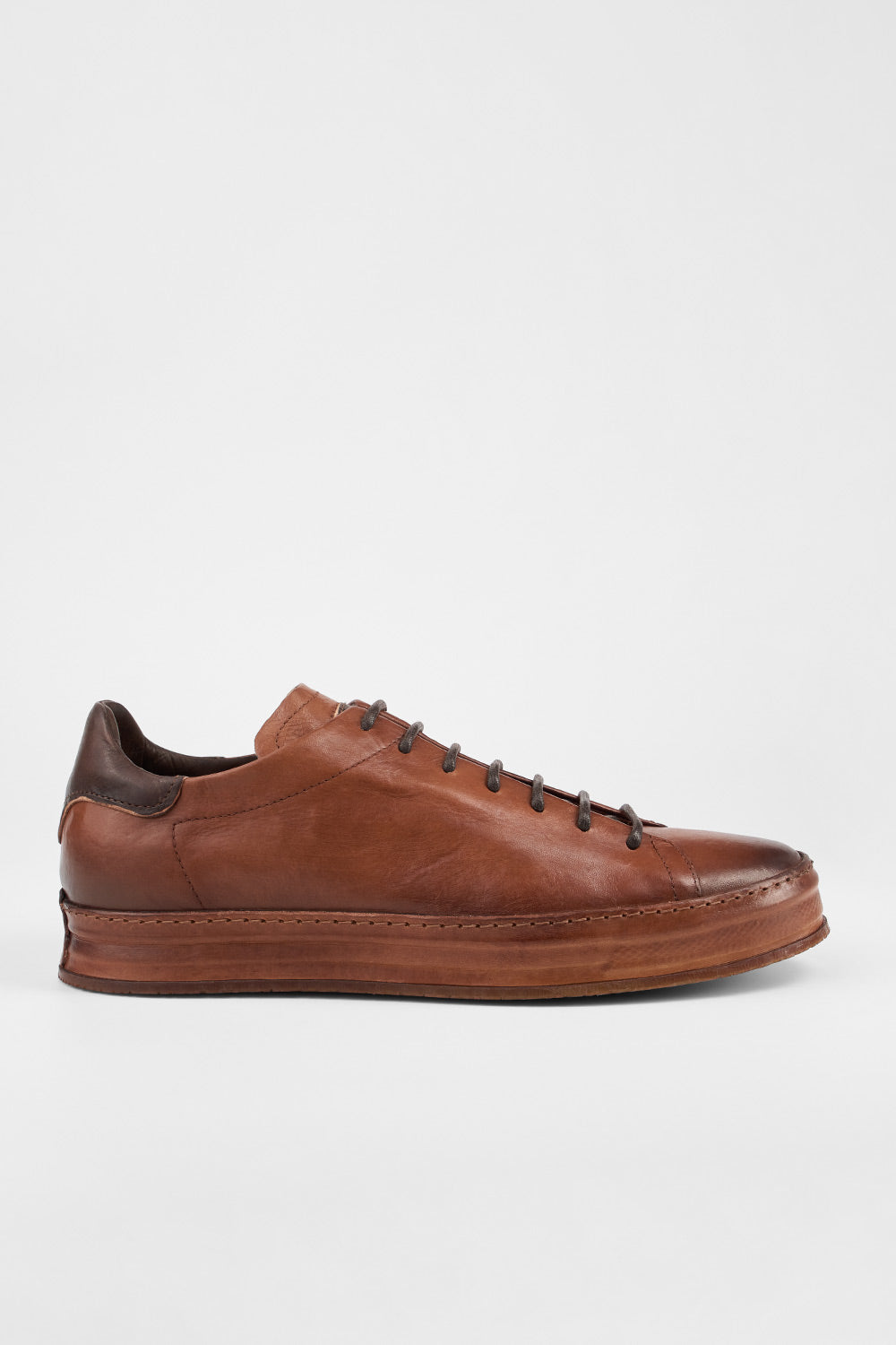 HAYES cognac distressed welted sneakers.