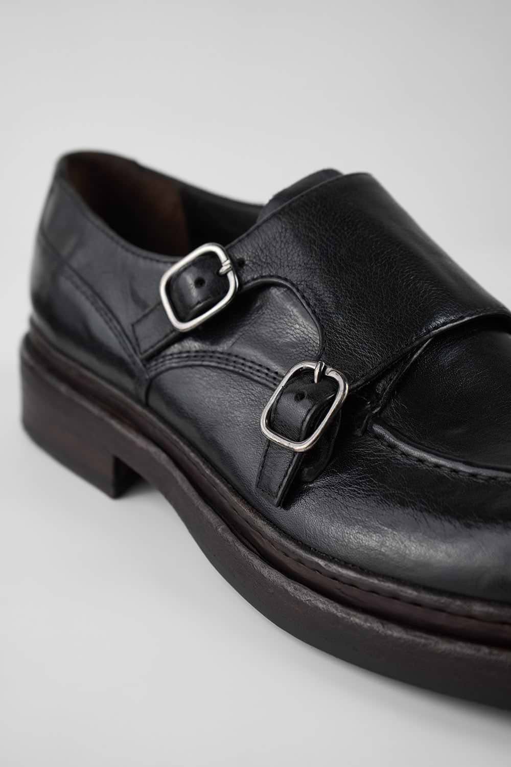 LAMBETH jet-black welted monk shoes.
