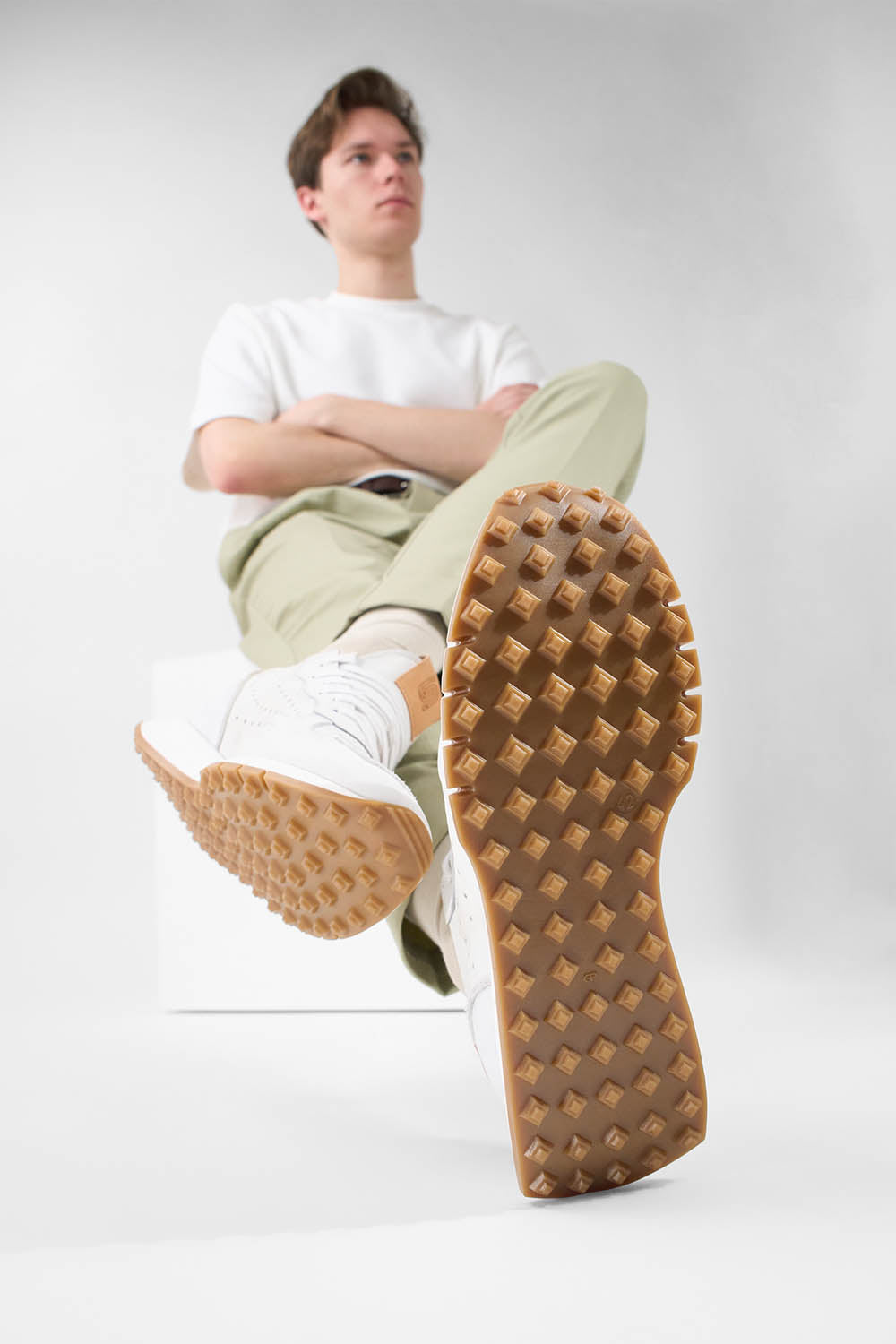 PEARCE limestone-white nubuck runners.