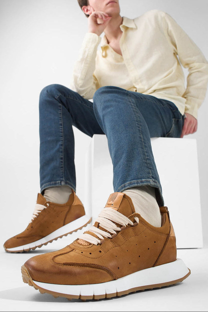 PEARCE rust-brown nubuck wingtip runners.