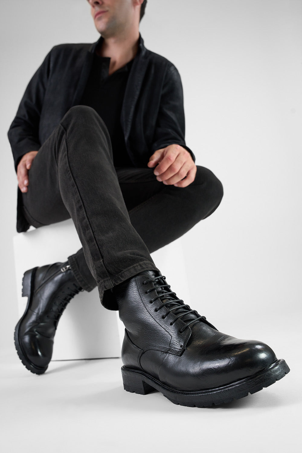 ROWLEY coal-black folded lace up boots.