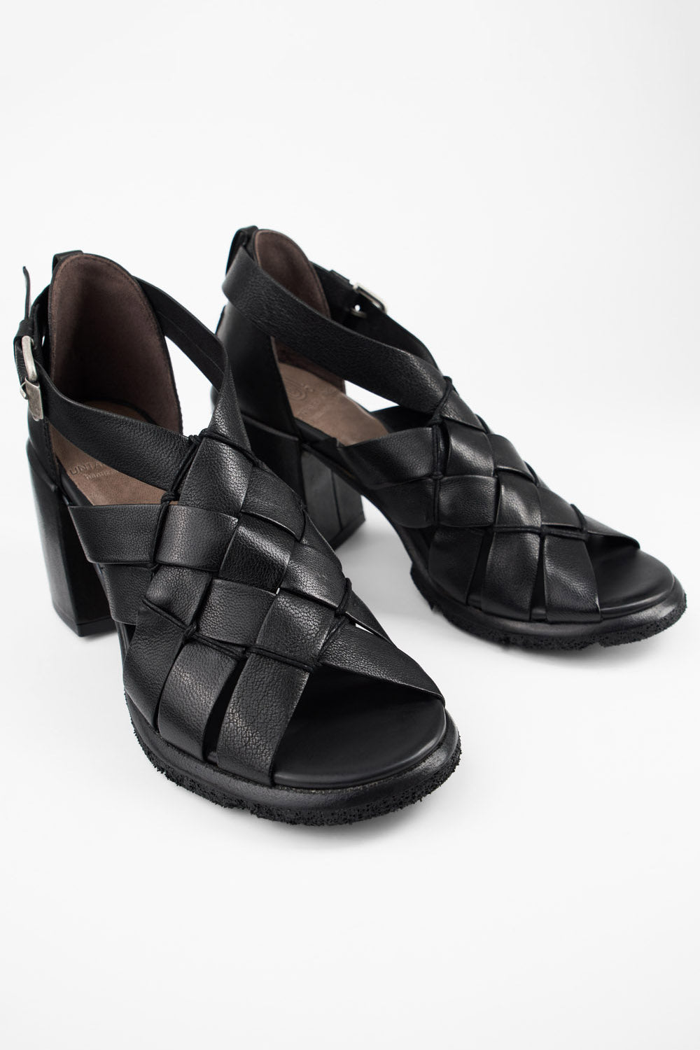 SHELLEY jet-black woven mid heel sandals.