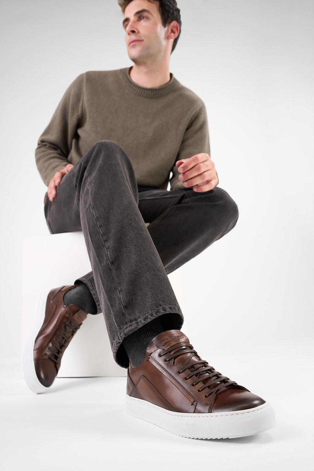 SKYE noble-brown triple stitched patina sneakers.