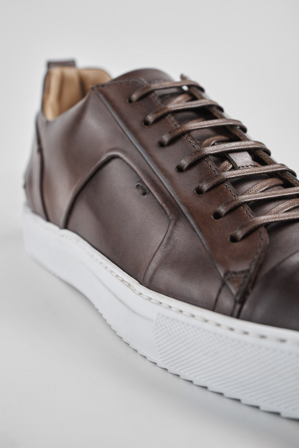 SKYE noble-brown folded patina sneakers.