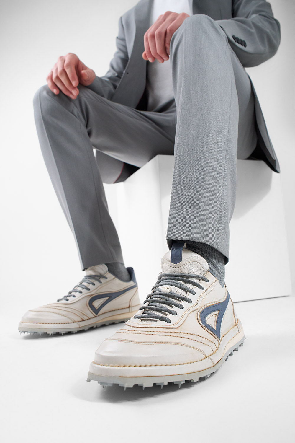 WYRE off-white & blue nappa sneakers.
