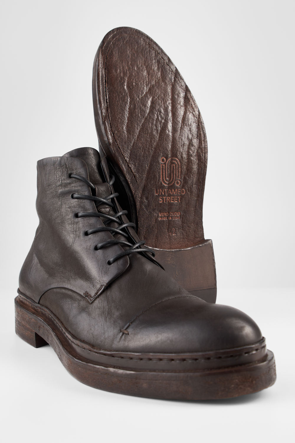 YALE ebony-brown welted derby lace up boots.