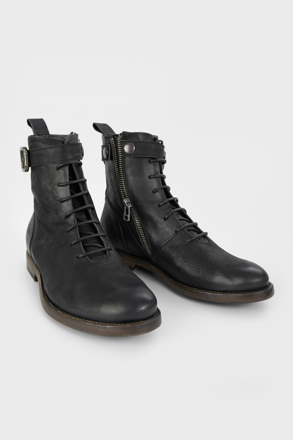 SLOANE matte-black lace up buckle boots.