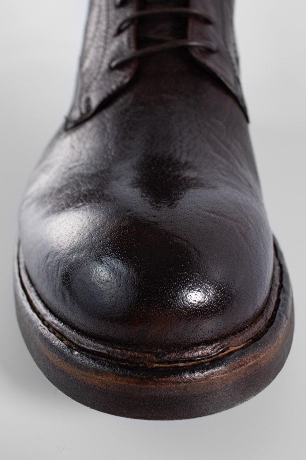 LENNOX cigar-brown military boots.