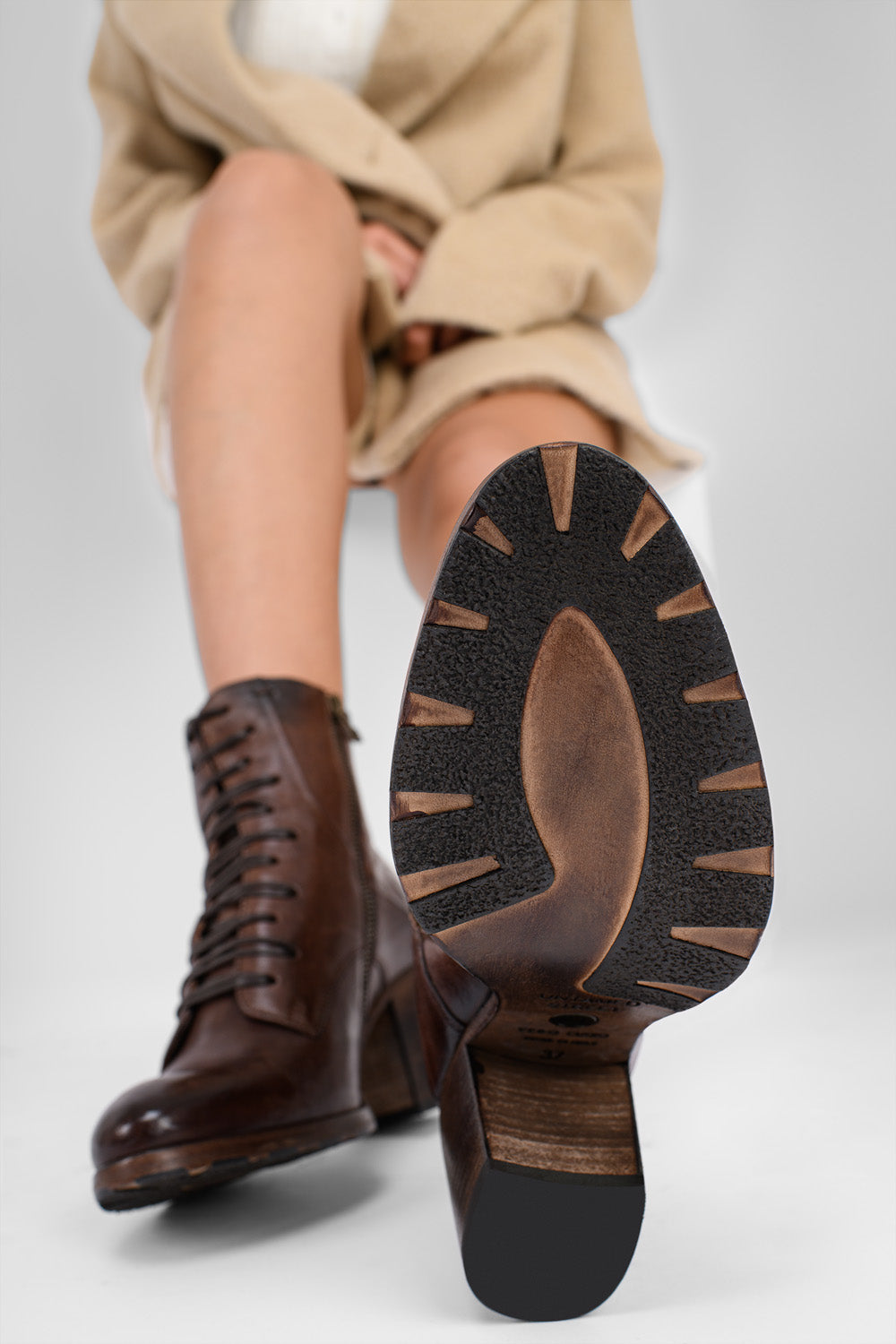 ASTON chocolate-brown lace up boots.