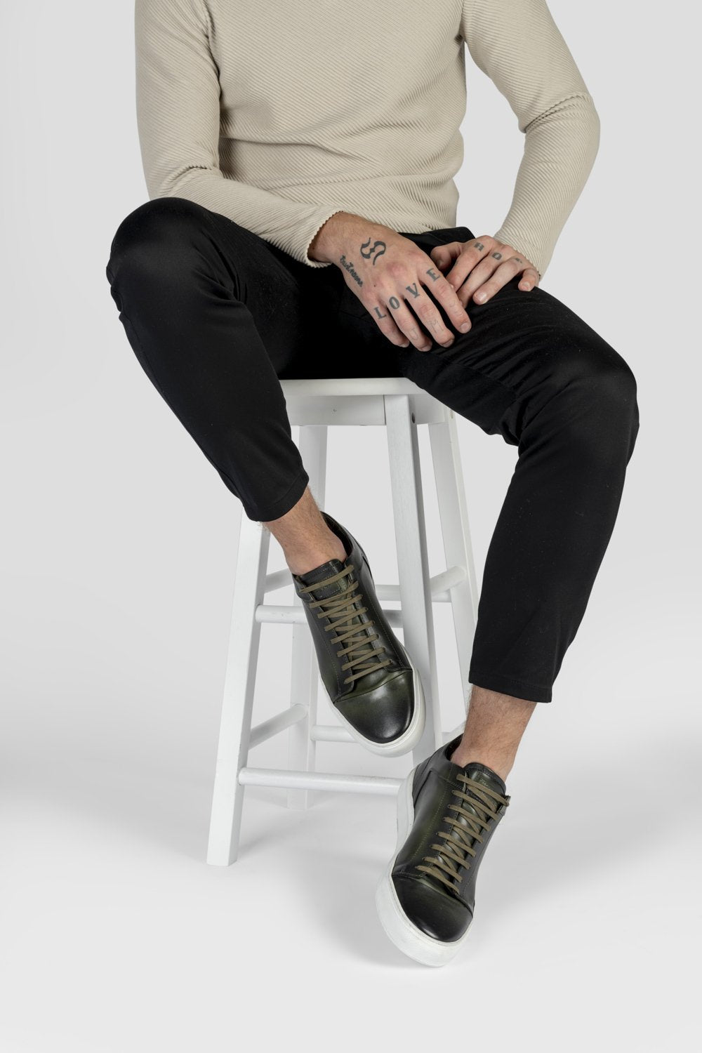 SOHO forest-green cap toe patina sneakers.